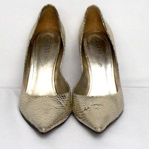 Gold snakeskin pumps